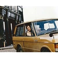 Roger Moore drives Rover from TV series The Persuaders 8x10 photo