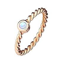 Paula & Fritz® Ring made of stainless steel, surgical steel 316L, rose gold-plated, cord pattern with inlaid opal, available ring sizes 47 (15) - 57 (18)