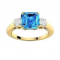 GLOW SPECTRA JEWELS 1.28 Cttw Asscher Shape Simulated Blue Topaz & White Cubic Zirconia Wedding Engagement Three Stone Ring In 14K Yellow Gold Plated 925 Sterling Silver