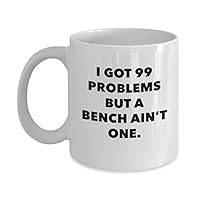 Funny Bodybuilding Coffee Mug-I Got 99 Problems But A Bench Ain'T One-Workouts Lovers Gifts - Unique Cool Cute Humor Sarcasm - Gift Idea For People Who Love Workouts-Novelty 11oz White Ceramic Tea Cup