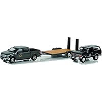 Greenlight 31150-C Hollywood Hitch & Tow Series 11 - Yellowstone 2018 F-150 Montana Livestock Association with 1992 Bronco Montana Livestock Association on Flatbed Trailer 1:64 Scale