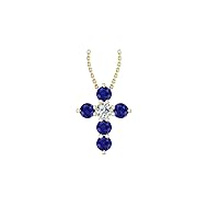 14k Yellow Gold timeless cross pendant set with 5 celestial blue sapphires (.47ct, AA Quality) encompassing 1 round white diamond, (.1ct, H-I Color, I1 Clarity), suspended on a 18