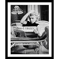 Buyartforless Framed Marilyn Monroe Reading Motion Picture Daily 1955 by Ed Feingersh 20x16 Photograph Art Print Poster,Black/White/Gray