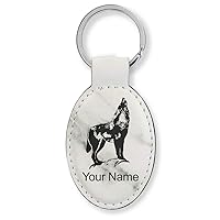 LaserGram Oval Keychain, Howling Wolf, Personalized Engraving Included (White Marble)