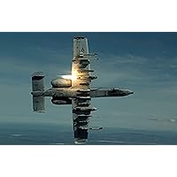 An A-10 Warthog breaks over the Pacific Alaska Range Complex during live fire training Poster Print by Stocktrek Images (17 x 11)