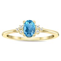 Women's Oval Shaped Blue Topaz and Diamond Half Moon Ring in 10K Yellow Gold