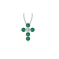 14k White Gold timeless cross pendant set with 5 beautiful green emeralds (.40ct, AA Quality) encompassing 1 white diamond, (.1ct, H-I Color, I1 Clarity), dangling on a 18