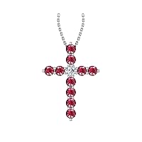 14k White Gold timeless cross pendant set with 10 beautiful red ruby stones (1/4ct, AA Quality) encompassing 1 round white diamond, (.055ct, H-I Color, I1 Clarity), dangling on a 18