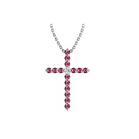 14k White Gold timeless cross pendant set with 15 round red ruby stones (1/2ct, AA Quality) encompassing 1 round white diamond, (.045ct, H-I Color, I1 Clarity), dangling on a 18
