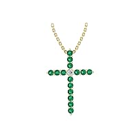 14k Yellow Gold timeless cross pendant set with 15 beautiful green emeralds (.42ct, AA Quality) encompassing 1 round white diamond, (.045ct, H-I Color, I1 Clarity), dangling on a 18
