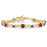 Gem Stone King 18K Yellow Gold Plated Red Garnet and Blue Created Sapphire Tennis Bracelet For Women | 4.83 Cttw | Gemstone January Birthstone | Round 5MM and 3MM | 6.5 Inch