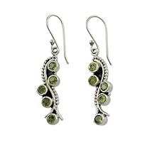NOVICA Handmade .925 Sterling Silver Peridot Dangle Earrings with 2.5 Carats Green India Flash Leaf Tree Birthstone [2 in L x 0.4 in W] 'Natural Glow'