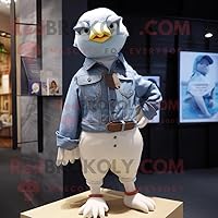 Cream Pigeon mascot costume character dressed with a Denim Shorts and Pocket squares