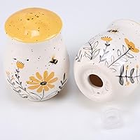 Primitives by Kathy Salt & Pepper Set - features bees buzzing over flowers with yellow accents. Shakers include unique openings to tell them apart, with plastic stoppers for easy refilling & cleaning
