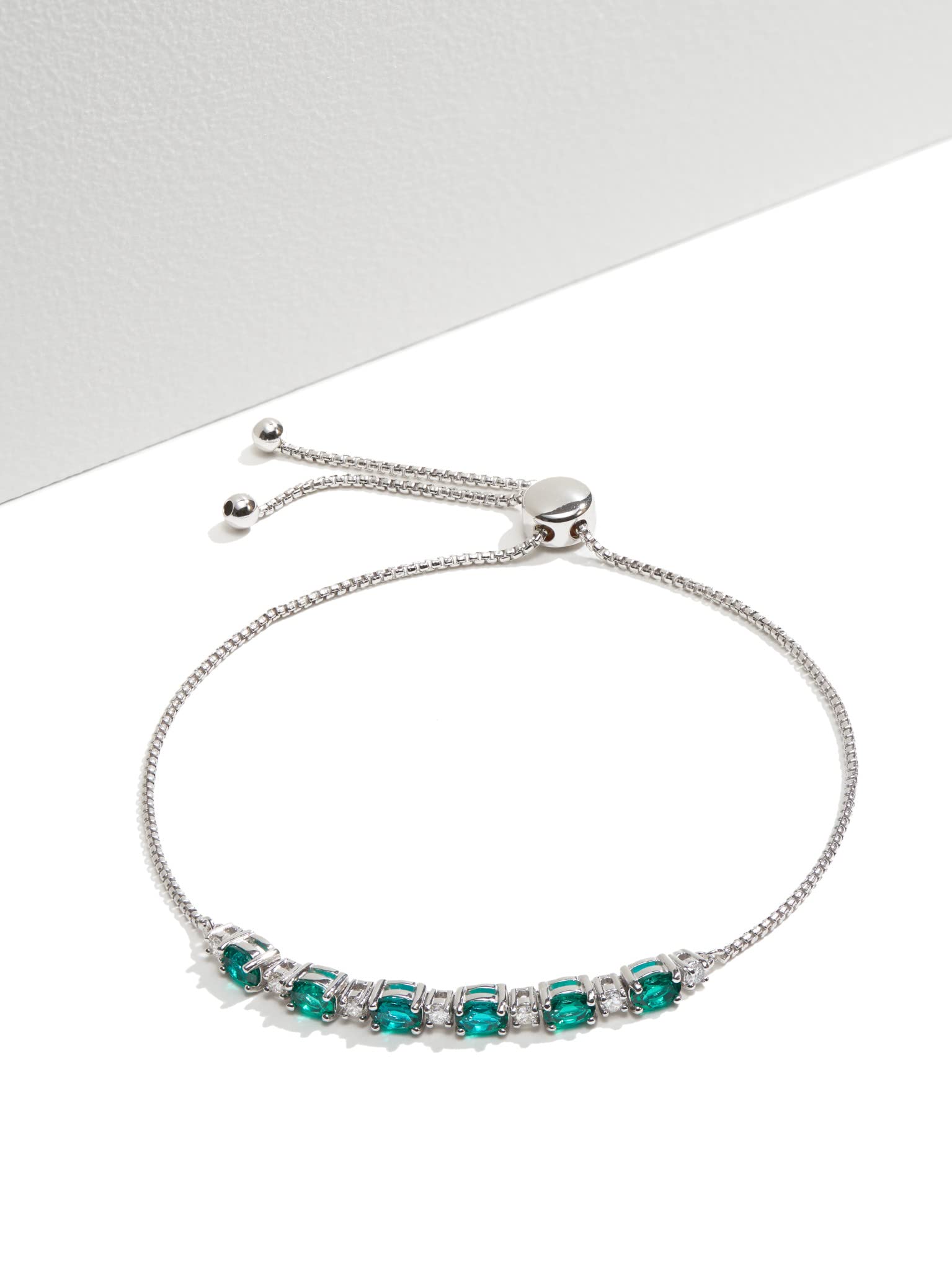 Amazon Collection 0.175 cttw Lab Grown Diamond and Created Emerald 925 Sterling Silver Bar Bolo Adjustable Bracelet