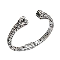 NOVICA Handmade Blue Topaz Cuff Bracelet .925 Sterling Silver from Bali Indonesia Birthstone [6 in L (end to End) x 0.4 in W] 'Celuk Royalty'