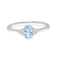 1.00 Cts Oval Blue Aquamarine Gemstone Simulated Diamond Accents 9K Gold Solitaire Ring