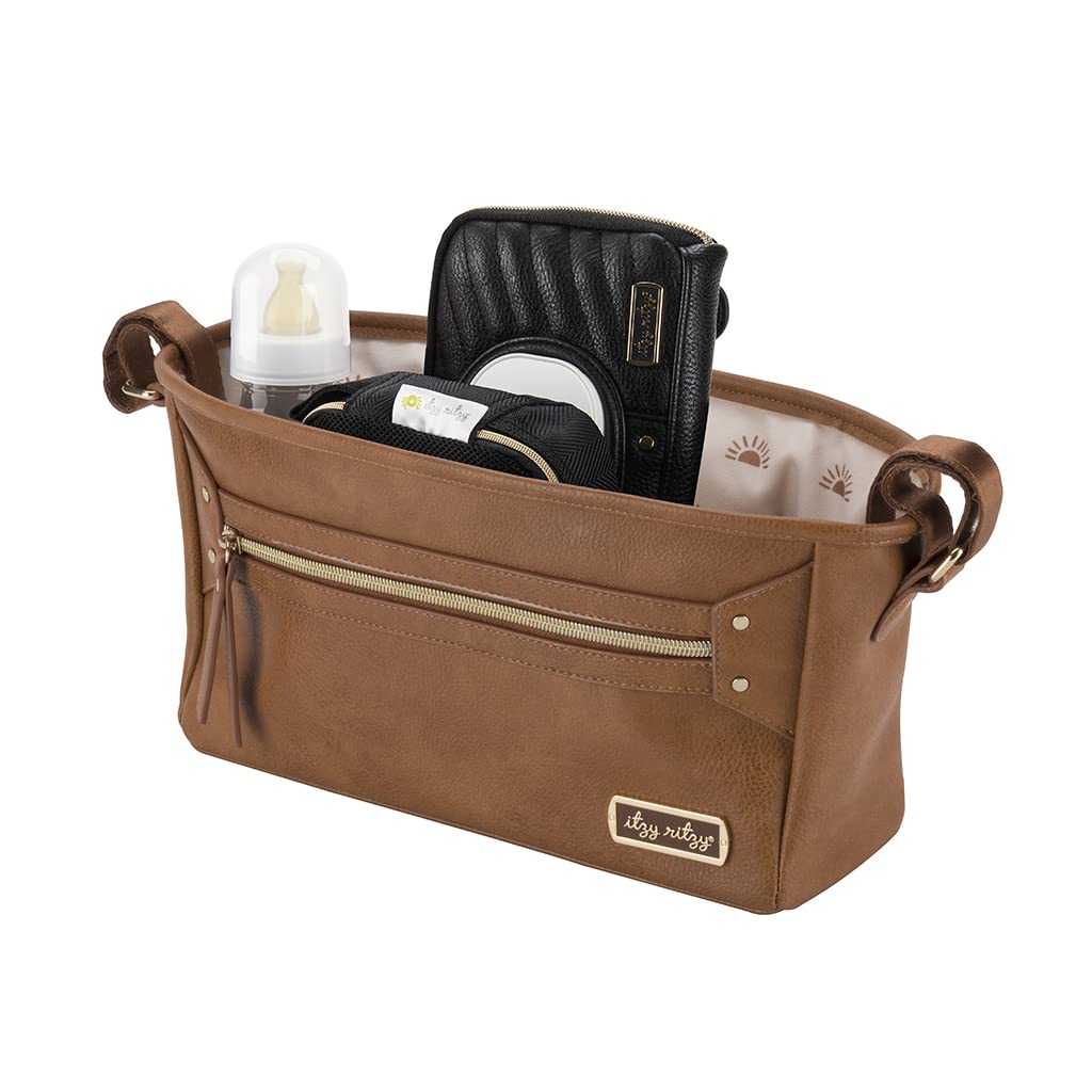 Itzy Ritzy Adjustable Stroller Caddy – Stroller Organizer Featuring Two Built-in Pockets, Front Zippered Pocket and Adjustable Straps to Fit Nearly Any Stroller, Cognac