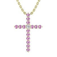 14k Yellow Gold timeless cross pendant set with 15 resilient pink sapphires (1/4ct, AA Quality) encompassing 1 round white diamond, (.025ct, H-I Color, I1 Clarity), hanging on a 18