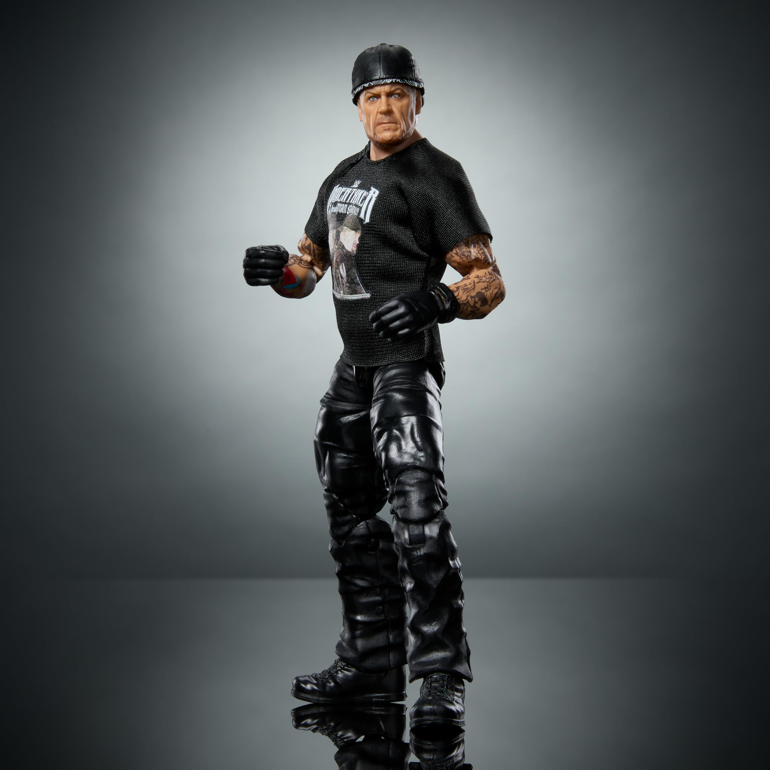 Mattel WWE Elite Action Figure & Accessories, 6-inch Collectible Undertaker with 25 Articulation Points, Life-Like Look & Swappable Hands