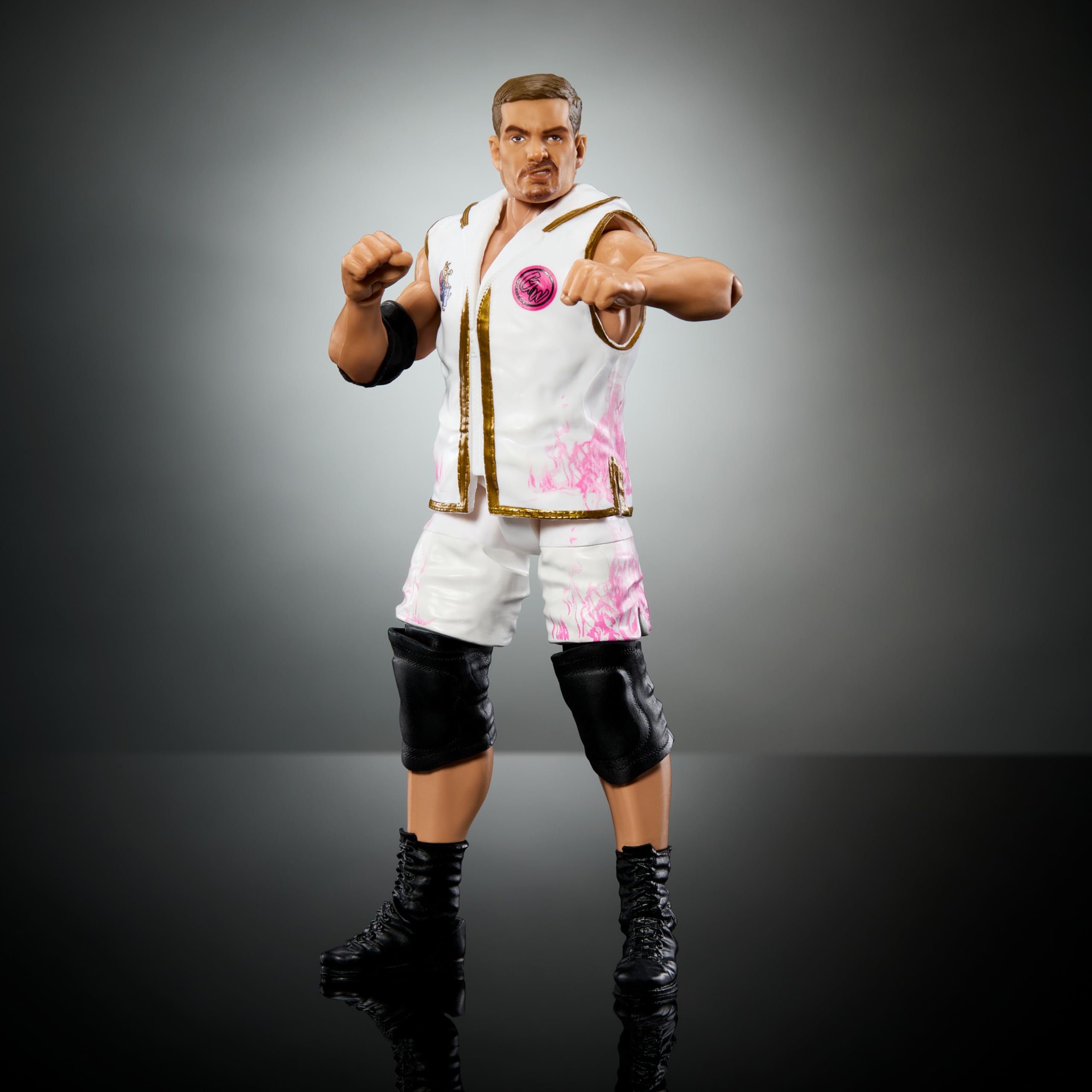 WWE Elite Action Figure & Accessories, 6-inch Collectible Grayson Waller with 25 Articulation Points, Life-Like Look & Swappable Hands
