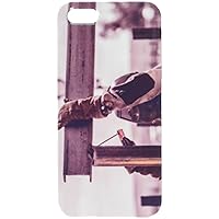 Welder worker welding metal by electrode cell phone cover case iPhone5