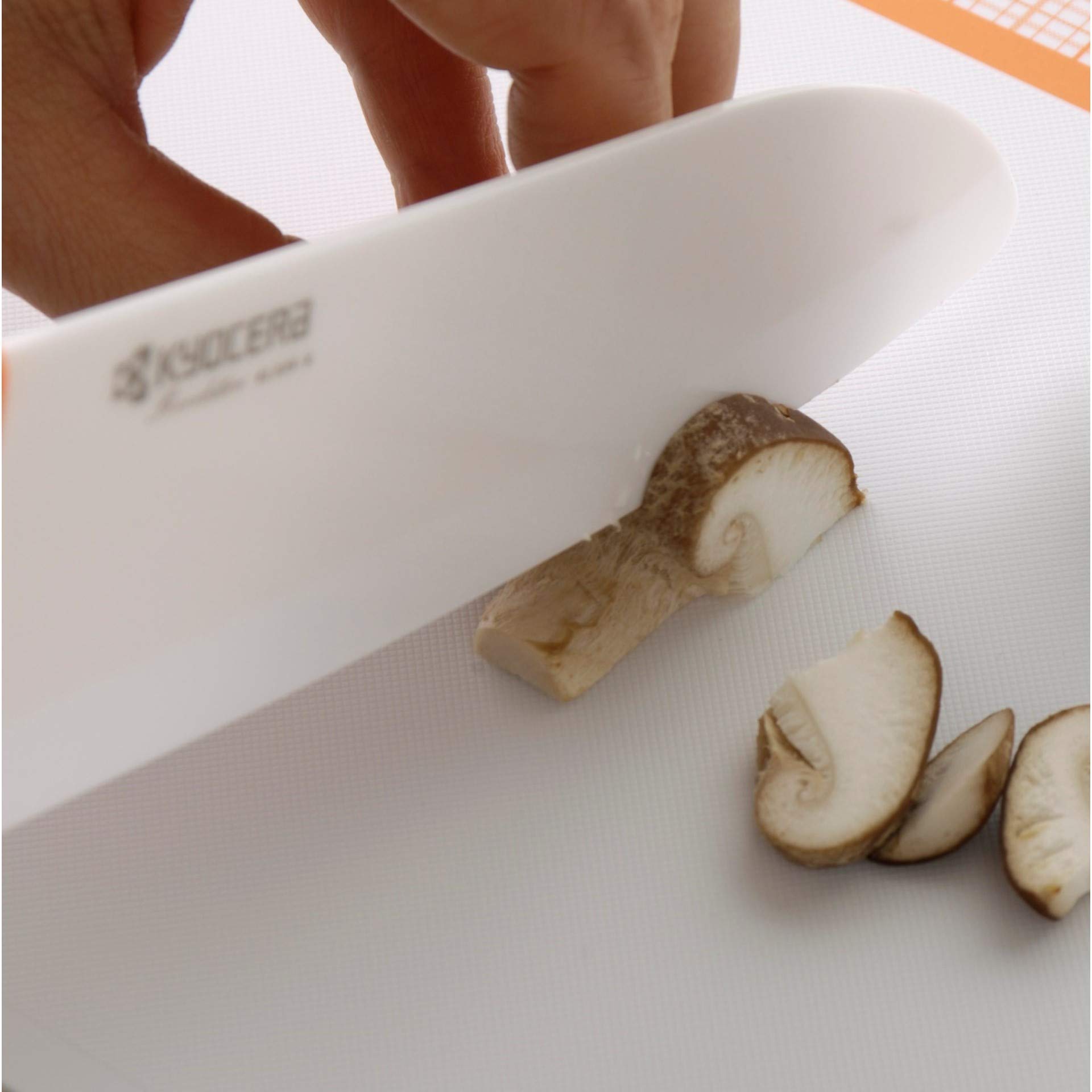 Kyocera Advanced Ceramic Revolution 4-Piece Knife Set: Includes 6-inch Chef's Santoku, 5.5-inch Santoku, 4.5-inch Utility and 3-inch Paring-Red Handles w/ White Blades