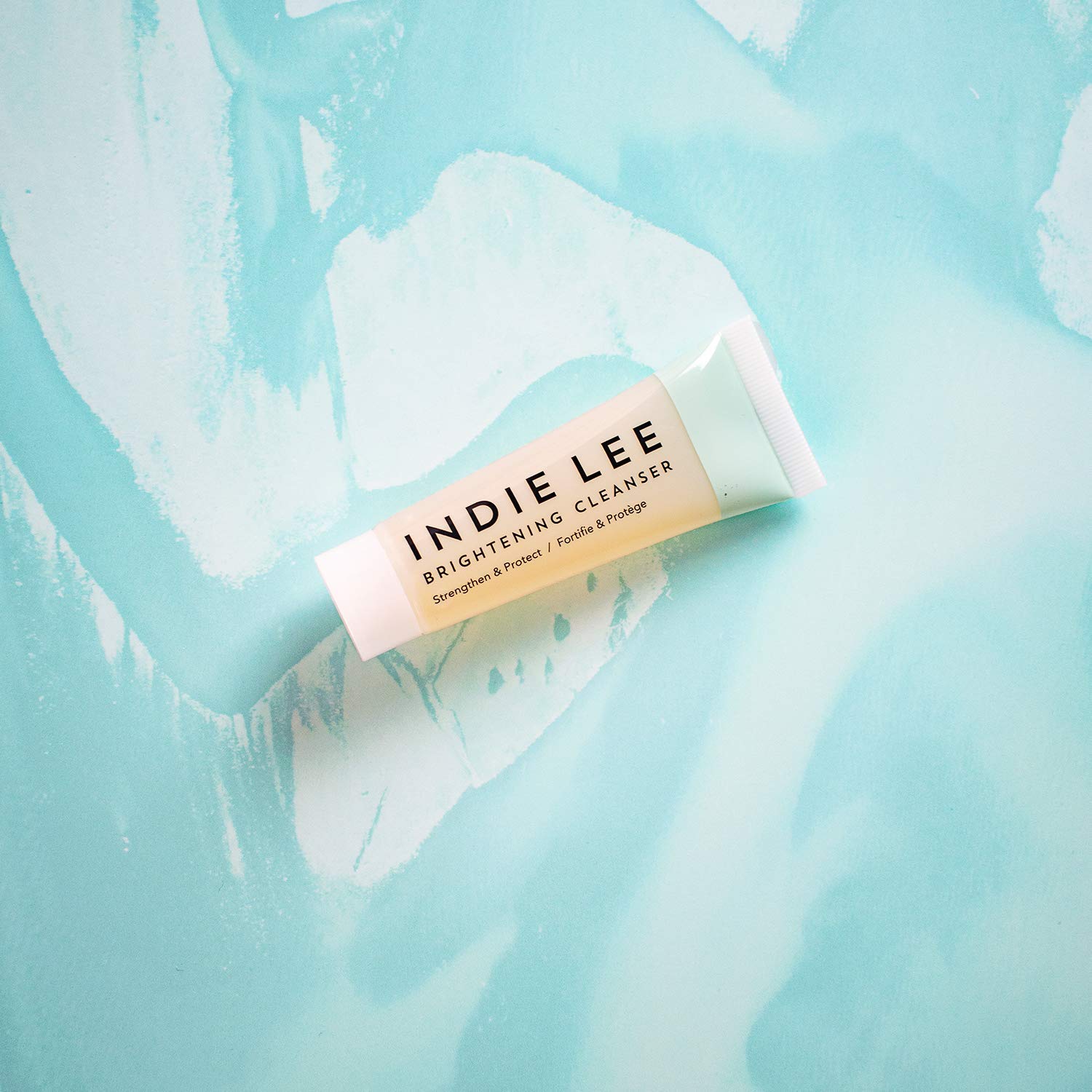 Indie Lee Brightening Cleanser - Exfoliating Gel-to-Scrub Face Wash + Makeup Remover with Vitamin C + Antioxidants to Help Visibly Brighten, Firm + Protect Skin (1oz / 30ml)