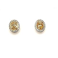 Yellow Diamond Oval Stud Earrings 3.13 Carats GIA Certified Platinum/18 KYG Halo