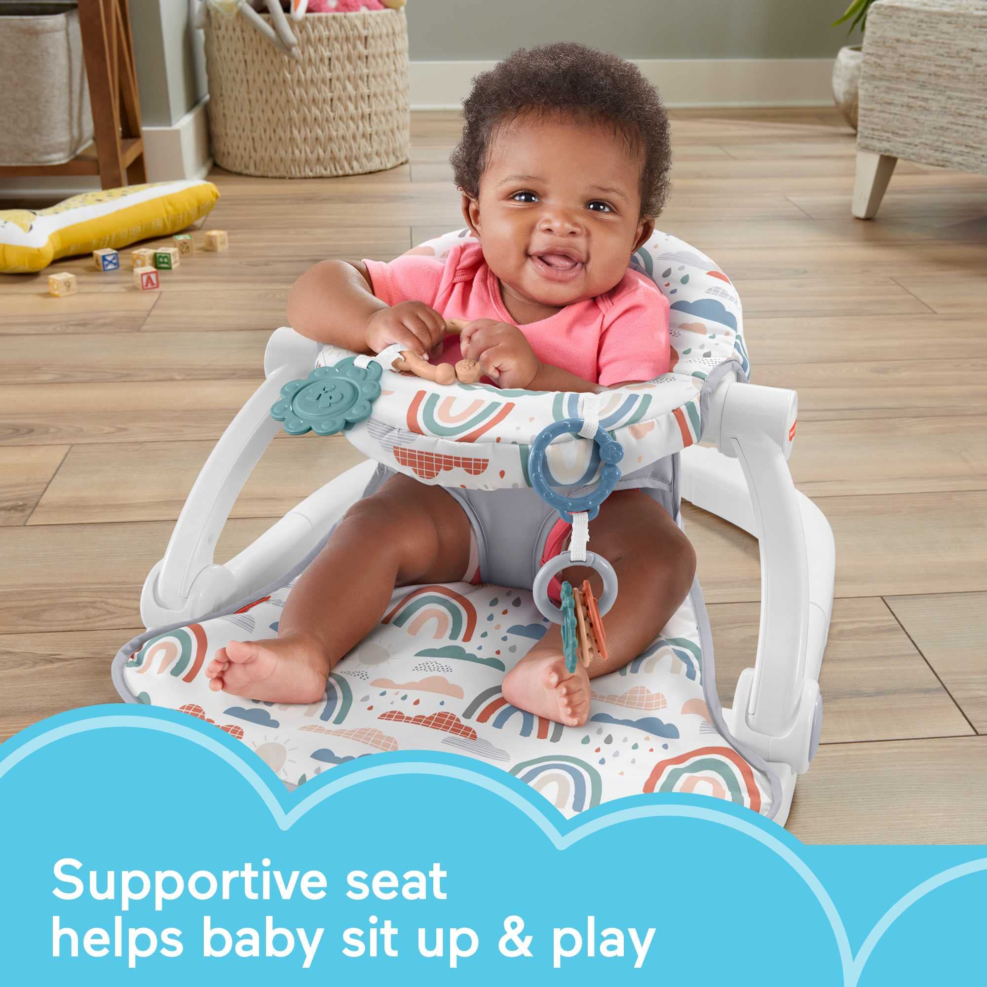 Fisher-Price Portable Baby Chair Sit-Me-Up Floor Seat with 2 Developmental Toys, Rainbow Showers