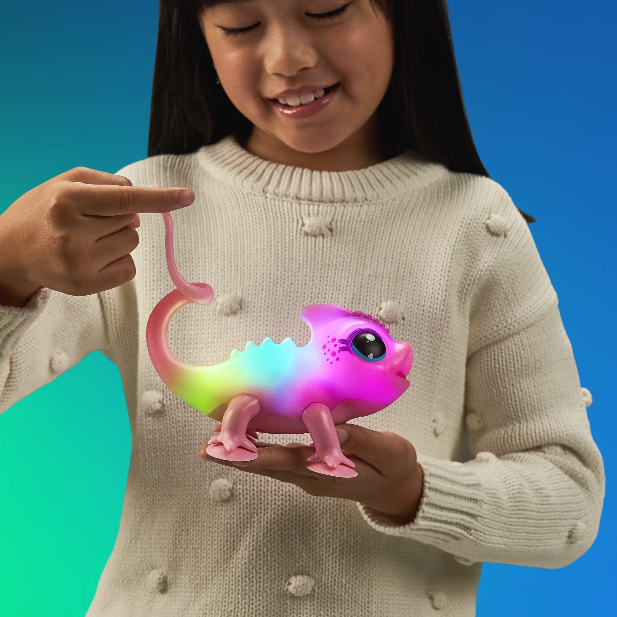 Little Live Pets Lil' Chameleon S2 Single Pk Nova includes 1 Eleectronic Toy, 1 Instruction Manual, 2 AAA Batteries