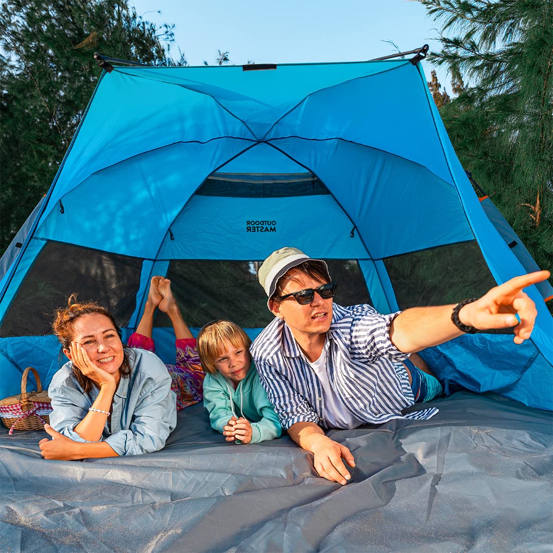 OutdoorMaster Pop Up Beach Tent for 4 Person - Easy Setup and Portable Beach Shade Sun Shelter Canopy with UPF 50+ UV Protection Removable Skylight Family Size - Blue