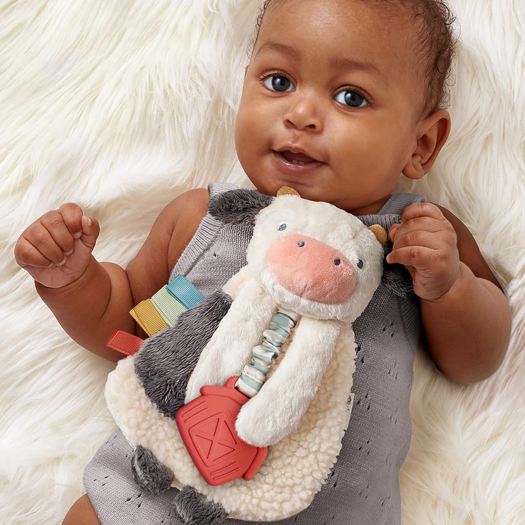 Itzy Ritzy - Itzy Lovey Including Teether, Textured Ribbons & Dangle Arms; Features Crinkle Sound, Sherpa Fabric and Minky Plush; Cow