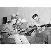 Musicians 1940 Na Farmer And His Brother Playing Music At Home In Pie Town New Mexico Photograph By Russell Lee 1940 Poster Print by (24 x 36)