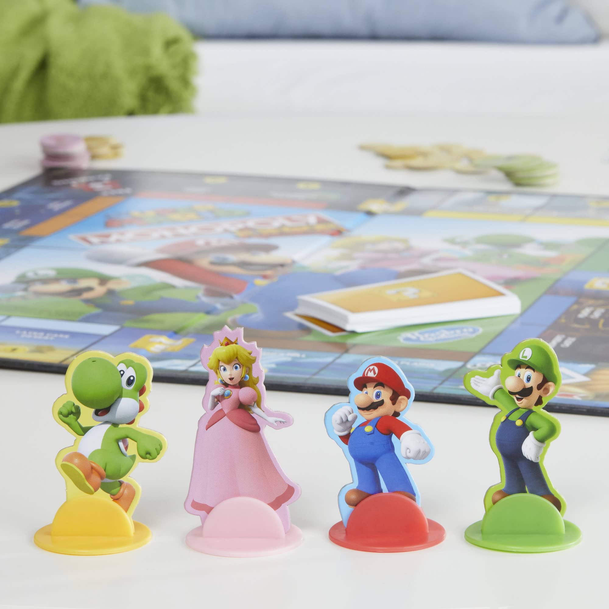 Monopoly Junior Super Mario Edition Board Game, Fun Kids' Ages 5 and Up, Explore The Mushroom Kingdom as Mario, Peach, Yoshi, or Luigi (Amazon Exclusive)