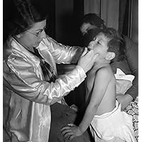 California Doctor 1939 Na Traveling Public Health Doctor Conducting A Well-Baby Clinic In Local School In Calipatria California The Clinic Is Attended By Many Migratory Mothers Who Work In The Nearby