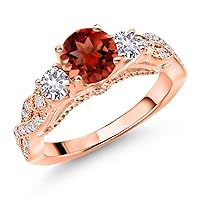 Gem Stone King 18K Rose Gold Plated Silver Red Garnet White Created Sapphire and White Moissanite Engagement Ring For Women (1.53 Cttw, Gemstone January Birthstone, Round 6MM and 3MM)