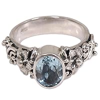 NOVICA Artisan Handmade Blue Topaz Single Stone Ring Oval Cut Silver with Floral Design Sterling Cocktail Indonesia Serenity Birthstone 'Frangipani Path'