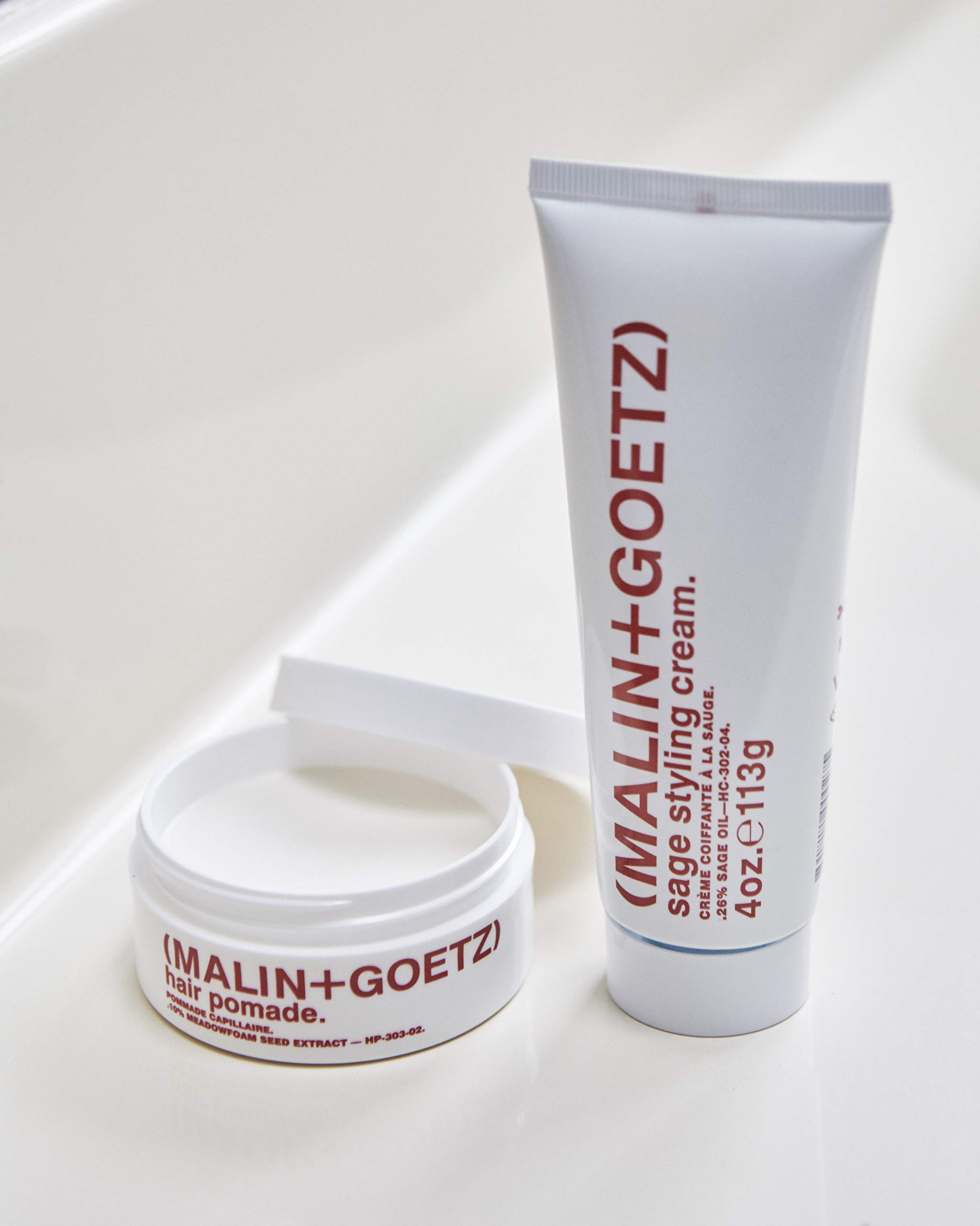 Malin + Goetz Hair Pomade â€” unisex firm lightweight flexible holds all day, for any hair type or texture. for natural shape, separation, wet or dry hair. cruelty-free vegan. 2 fl oz