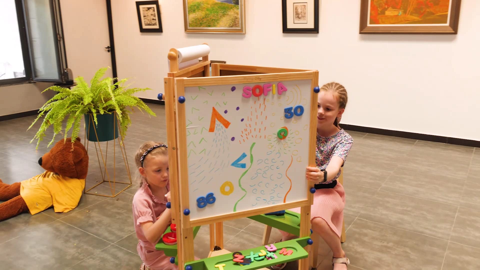 FLYING OLLY Deluxe Kids Art Easel(Solid Pinewood), Tri-Sided Toddler Easel w/Blackboard, Whiteboard& Chalkboard,1 Paper Roll, and Art Supplies(86-in-1 Set) for Toddler Kids 3-9 for Daycare, Kids Room