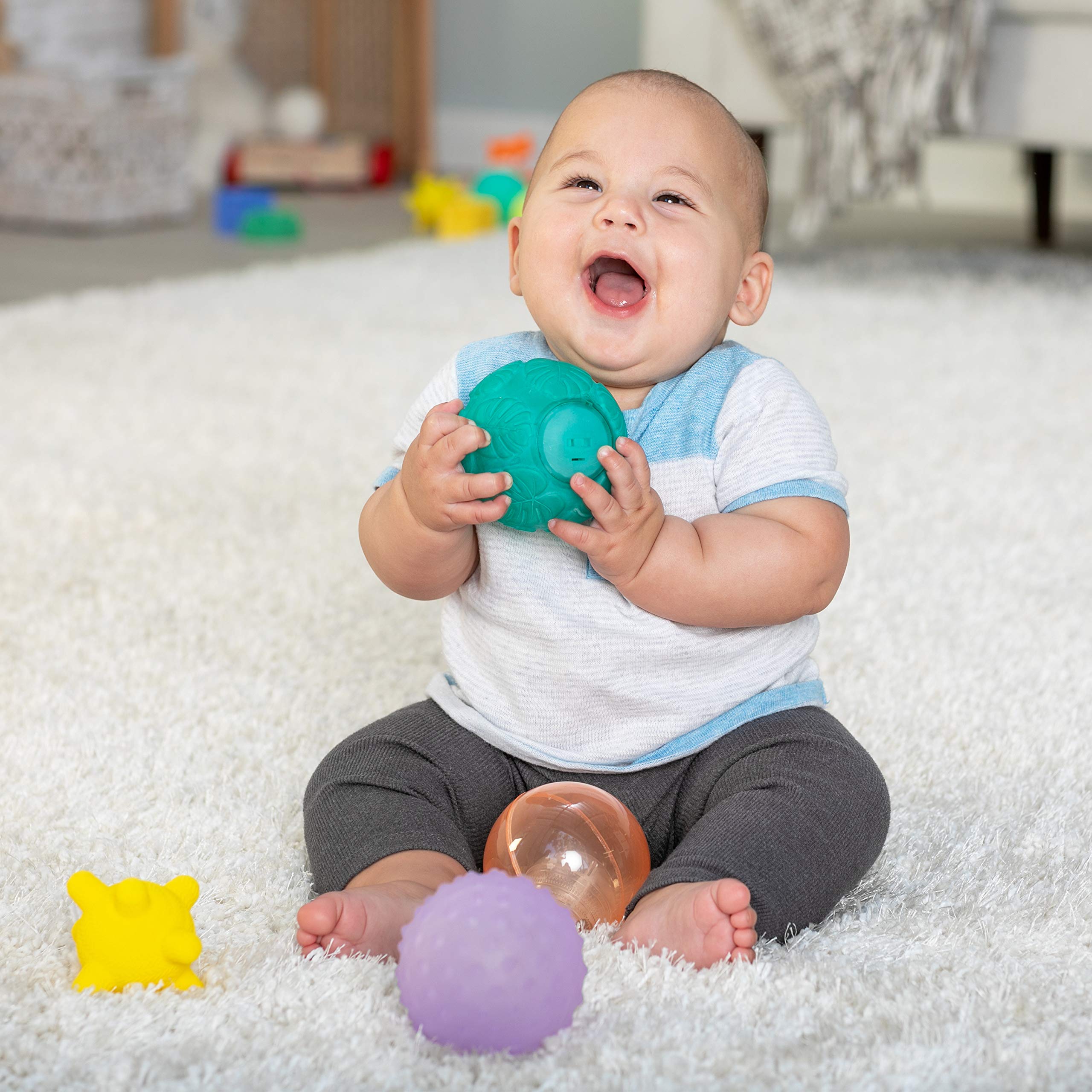 Infantino Activity Ball Set Music & Lights - 4 Colorful, Bouncy, & Multi-Textured Balls for Fine Motor Development for Little Hands