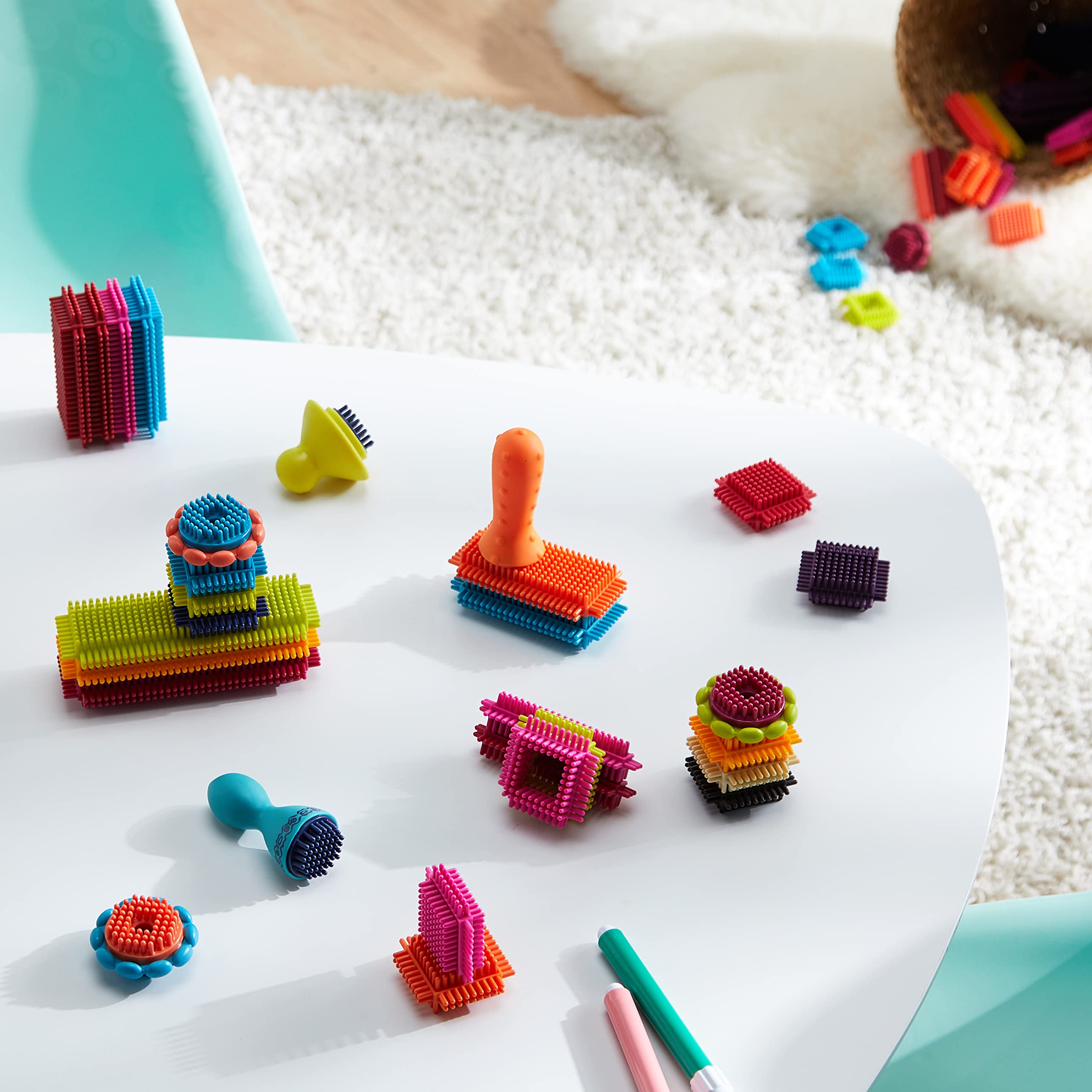 B. toys - Building Blocks for Kids – 68 Blocks in a Storage Pouch – STEM Toys – Soft & Interlocking – Bristle Block Stackadoos – 2 years +