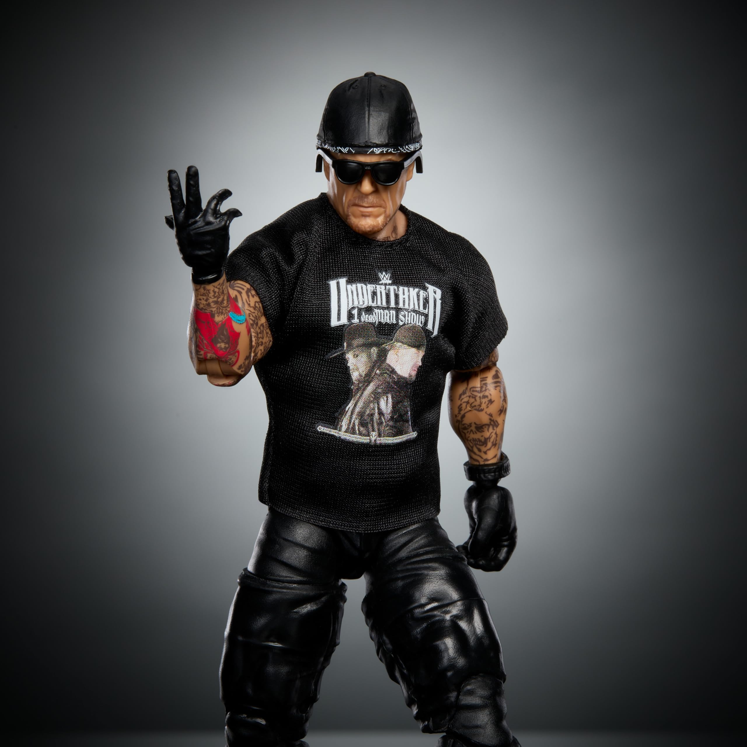Mattel WWE Elite Action Figure & Accessories, 6-inch Collectible Undertaker with 25 Articulation Points, Life-Like Look & Swappable Hands