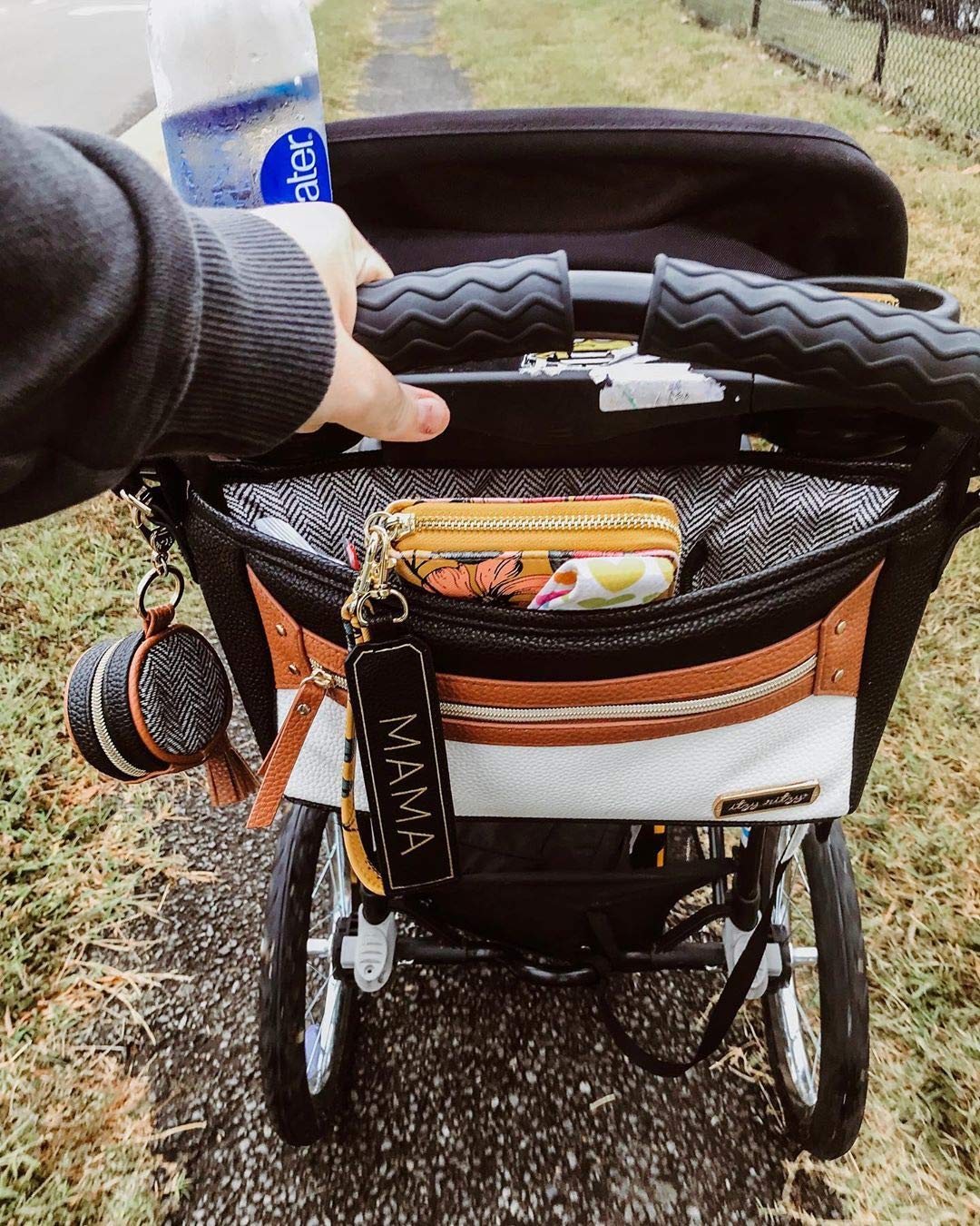 Itzy Ritzy Adjustable Stroller Caddy / Organizer Featuring Two Built-in Front Zippered Pocket and Adjustable Straps to Fit Nearly Any Stroller, Coffee and Cream