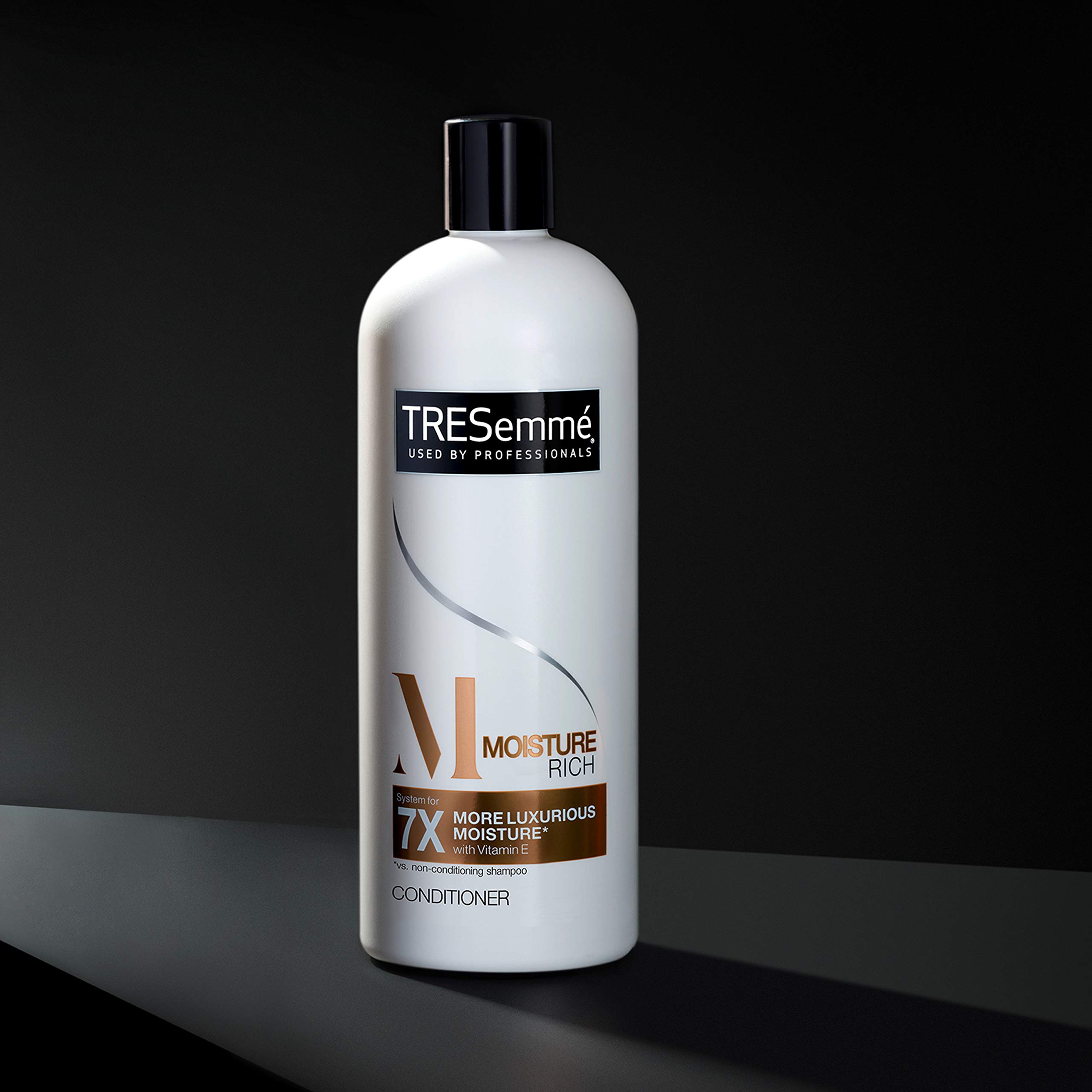 TRESemmé Conditioner Moisture Rich 3 Count for Dry Hair Professional Quality Salon-Healthy Look and Shine Moisture Rich Formulated with Vitamin E and Biotin 28 oz