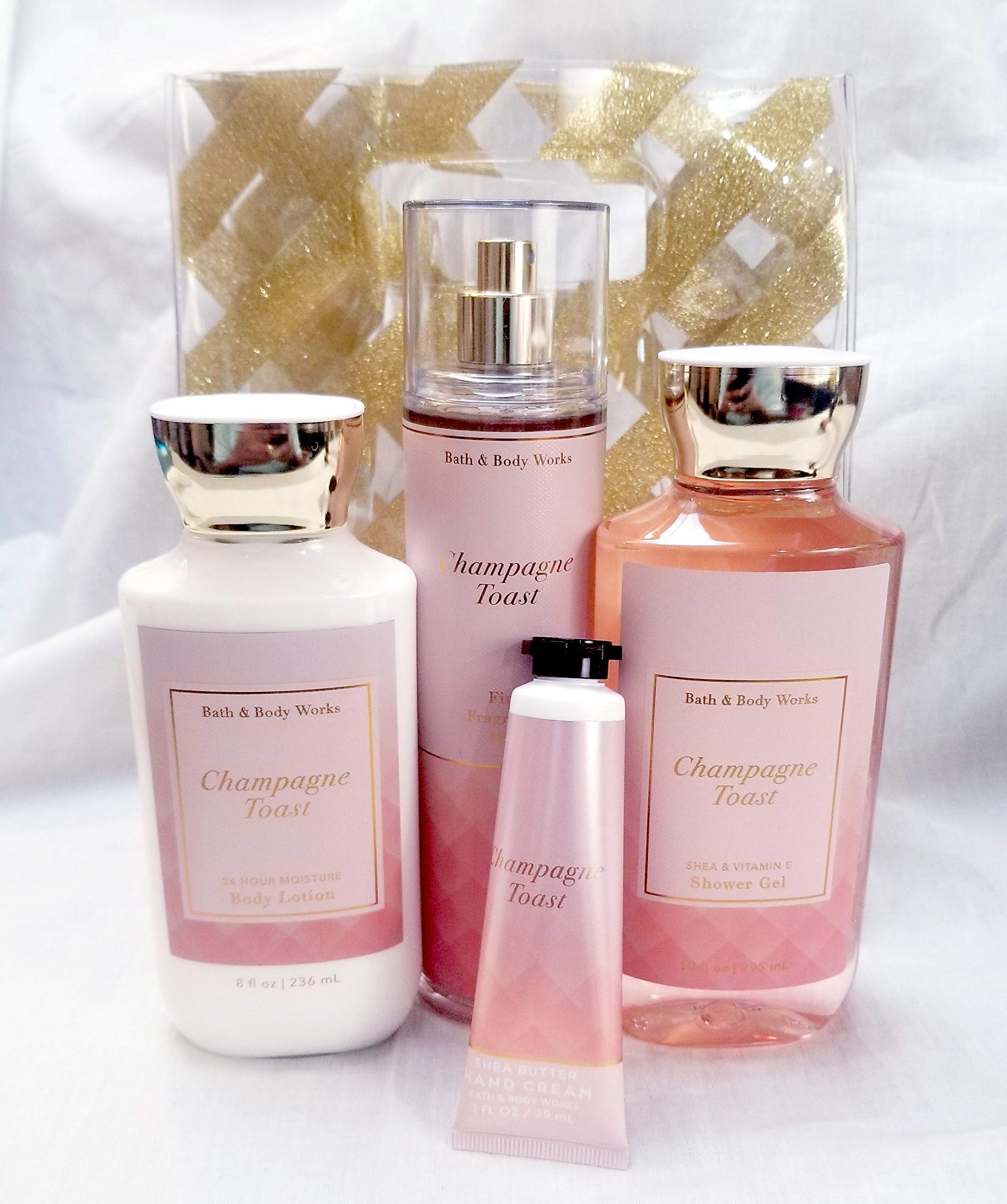 Bath and Body Works - Champagne Toast Body Care - Full Size 4 Piece Gift set + Random Gift Bag (Includes Fragrance Mist, Shower Gel, Lotion, and Ha...