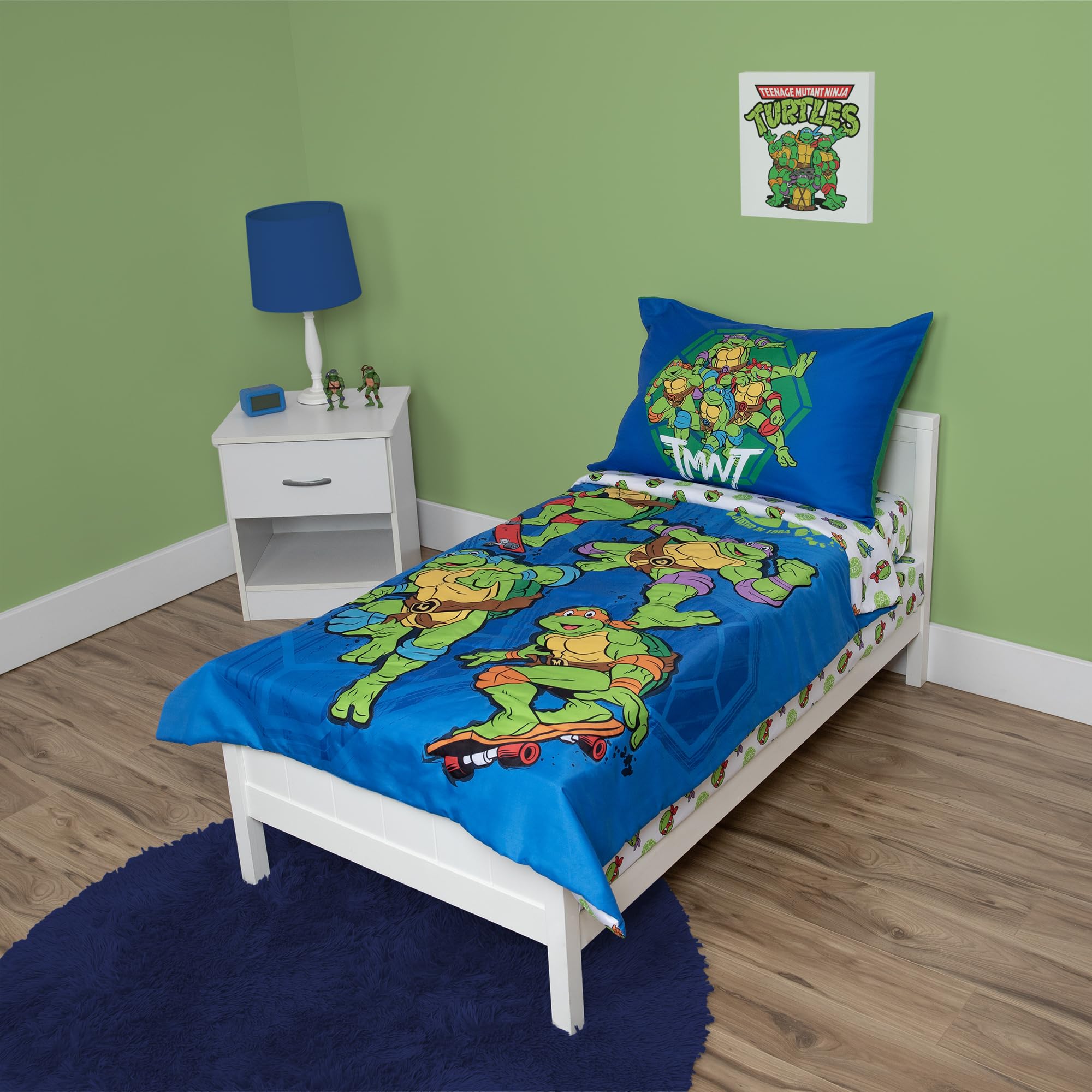 Teenage Mutant Ninja Turtles 4 Piece Toddler Bedding Set – Includes Comforter, Sheet Set – Fitted + Top Sheet + Reversible Pillowcase for Boys Bed, Blue