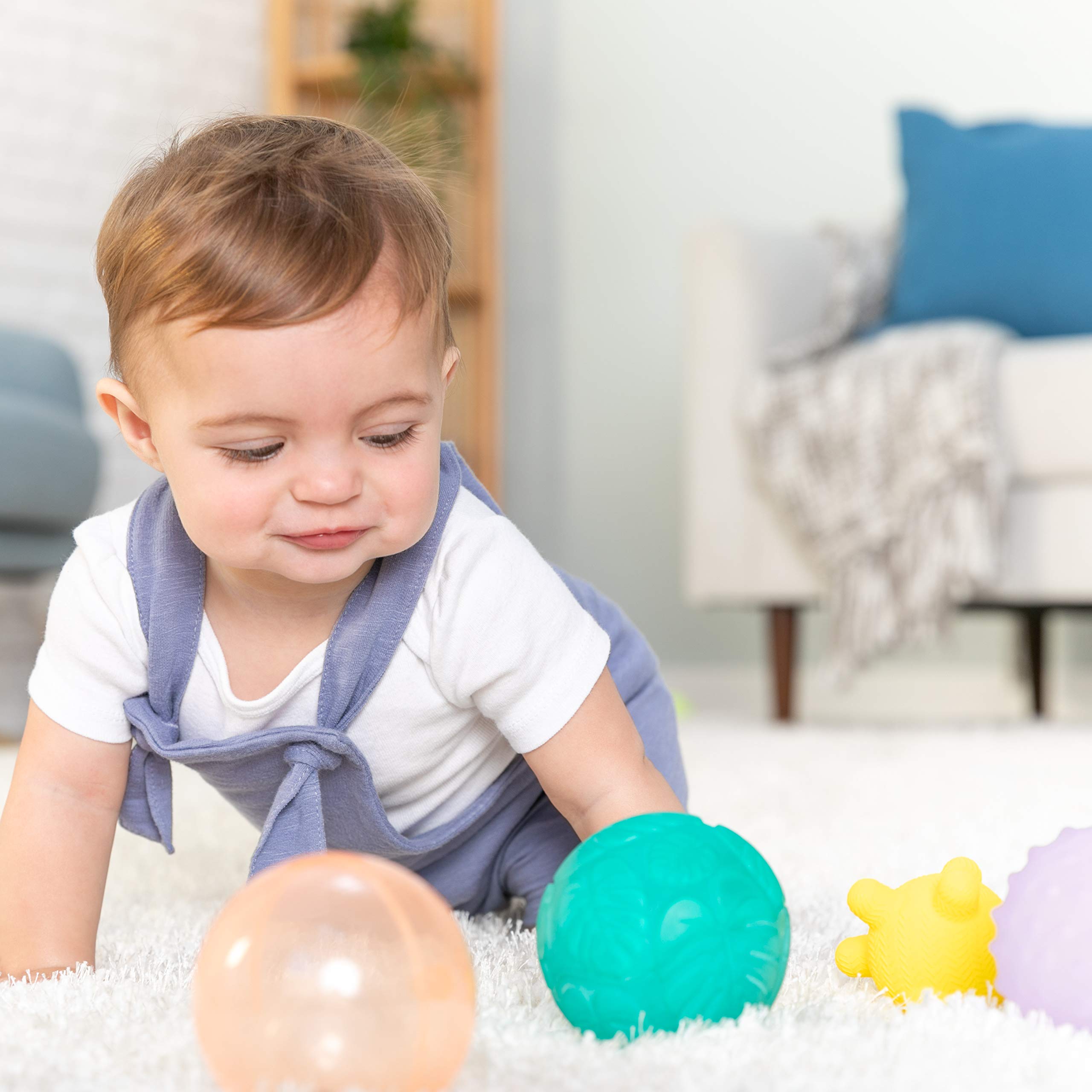 Infantino Activity Ball Set Music & Lights - 4 Colorful, Bouncy, & Multi-Textured Balls for Fine Motor Development for Little Hands