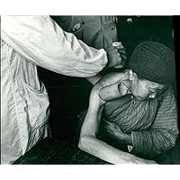 Vintage photo of Rheumatism treatment with acupuncture.