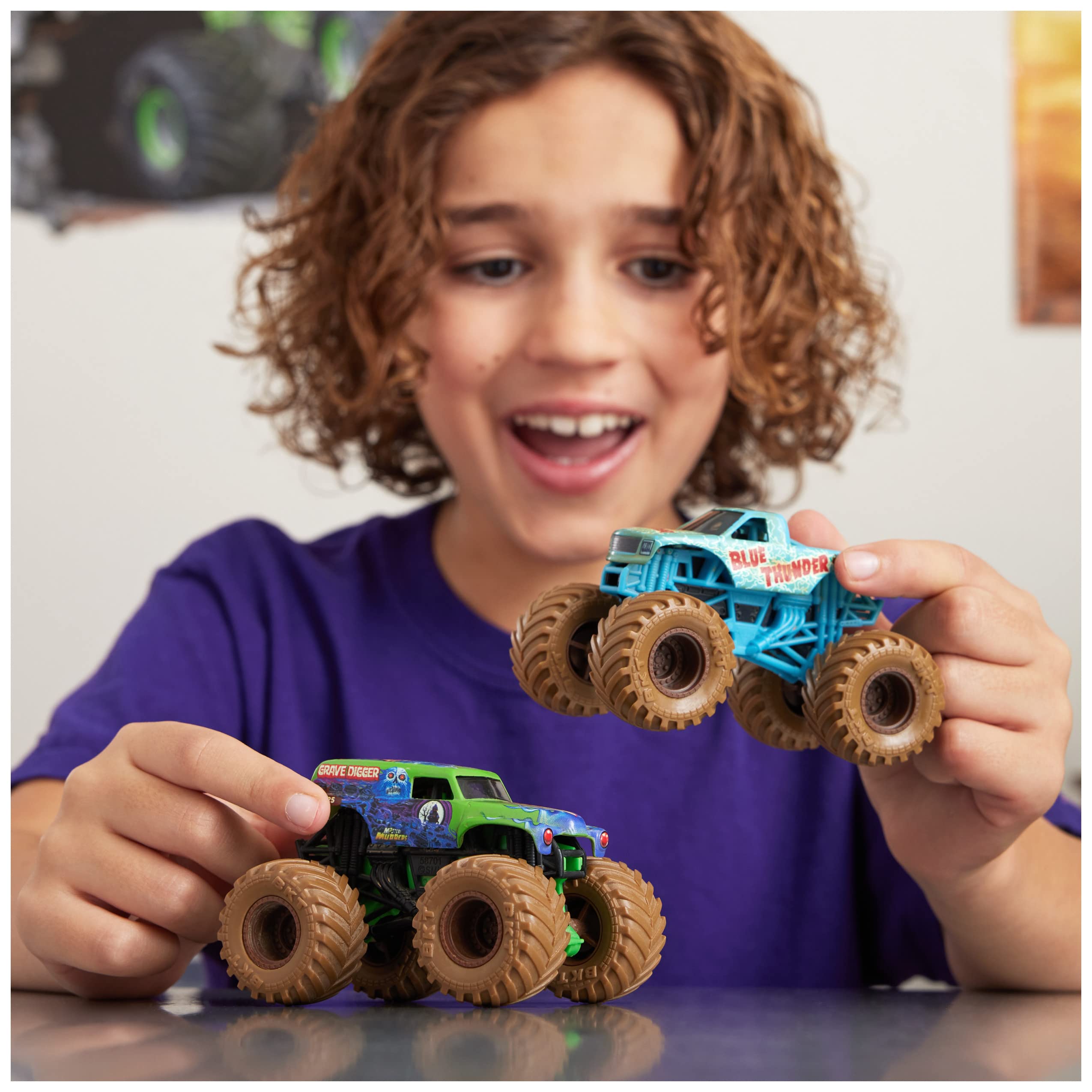 Monster Jam, Mystery Mudders 2-Pack Monster Trucks, Official 1:64 Grave Digger and Blue Thunder Die-Cast Vehicles, Wash To Reveal (Styles Will Vary)